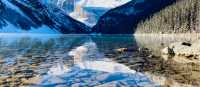 Admiring the crystal clear water of Lake Louise | Caroline Mongrain