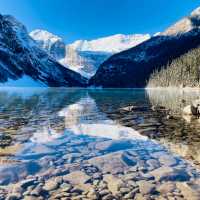 Admiring the crystal clear water of Lake Louise | Caroline Mongrain