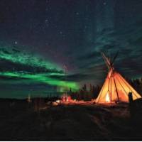 Viewing the Northern Lights from a teepee in the Northwest Territories | H Wang