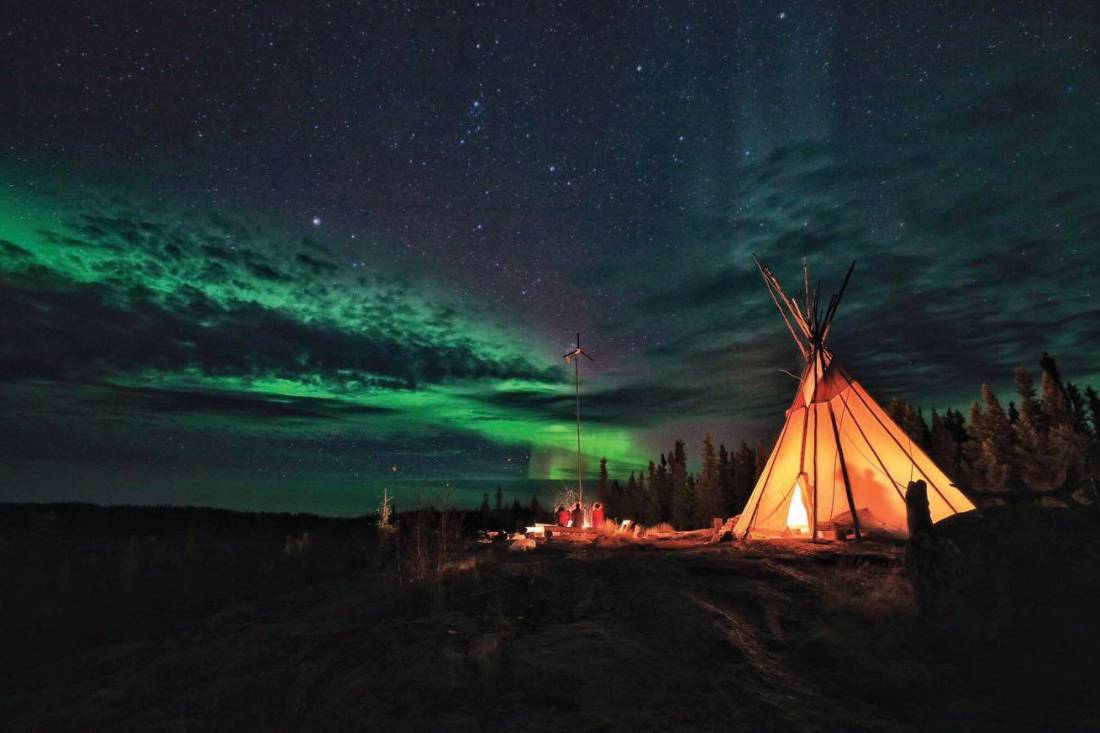 Viewing the Northern Lights from a teepee in the Northwest Territories |  <i>H Wang</i>