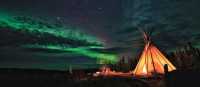 Viewing the Northern Lights from a teepee in the Northwest Territories | H Wang