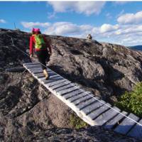 Bridges cross peaks and cut through forest on the Charlevoix Traverse | Pierre Bouchard