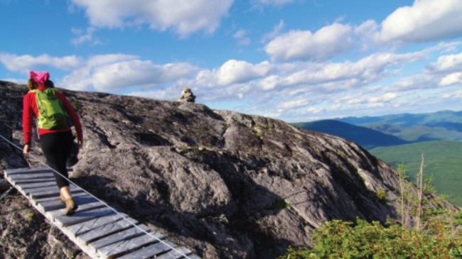 Bridges cross peaks and cut through forest on the Charlevoix Traverse | Pierre Bouchard