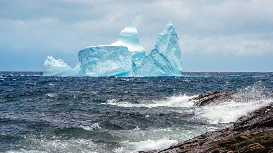 A castle-shaped iceberg floats past Cape Spear |  <i>Newfoundland and Labrador Tourism</i>