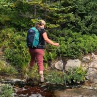 Hiking poles really help on slippery terrain along the trail |  <i>Julie Demers</i>