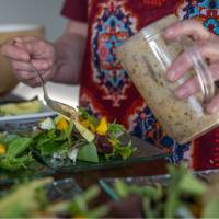 Our amazing host preparing a nutritious dinner for hungry hikers | Sherry Ott