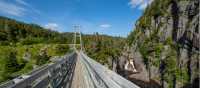 Suspension bridge to the former village of La Manche | Sherry Ott