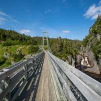 Suspension bridge to the former village of La Manche | Sherry Ott