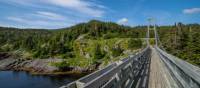 Suspension bridge to the former village of La Manche | Sherry Ott