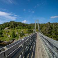 Suspension bridge to the former village of La Manche | Sherry Ott