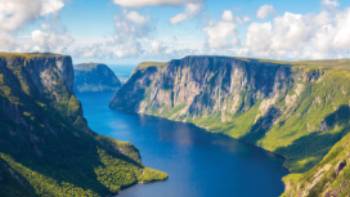 Enjoy a boat ride into Western Brook Fjord | ©Barrett & MacKay Photo