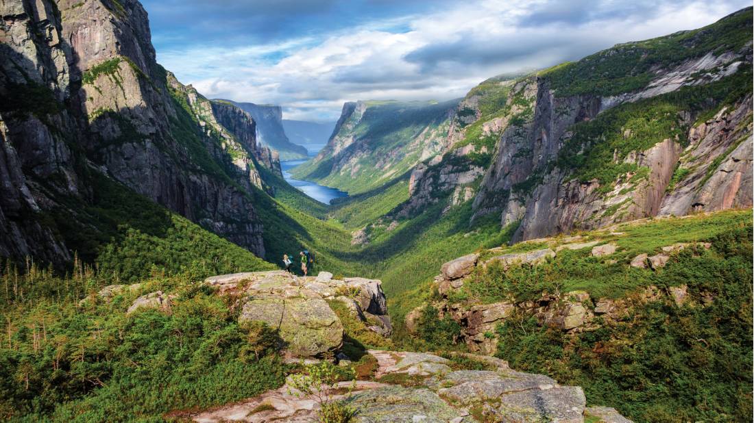 Taking in the view atop Western Brook Pond Fjord |  <i>Barrett & Mackay Photo</i>