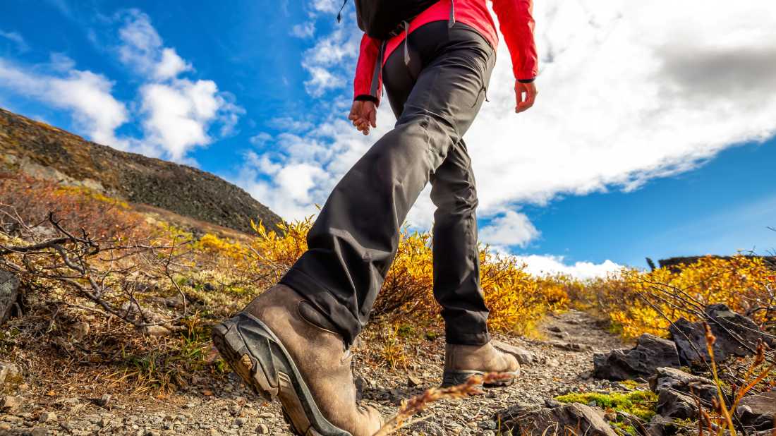 Walking a rocky mountain path in the Yukon