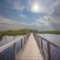 Take a stroll on this floating boardwalk to a quiet white sand beach | Sherry Ott