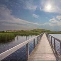 Take a stroll on this floating boardwalk to a quiet white sand beach | Sherry Ott