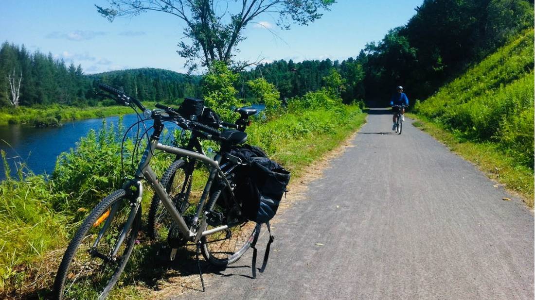 Flat and car-free, the converted railway trail offers a worry-free biking experience |  <i>Robin Esrock</i>