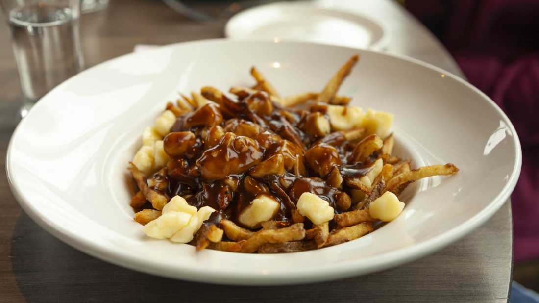 You can't visit Quebec without tasting a poutine |  André Quenneville