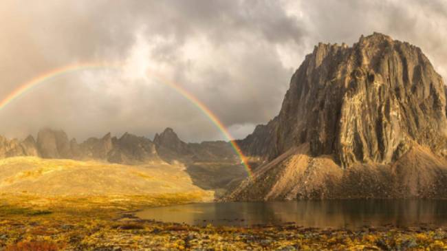 A colourful rainbow near Talus Lake in the Yukon | Robert Postma Photography