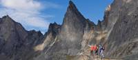 A captivating mountain range by a pristine lake in Tombstone Territorial Park | Government of Yukon/Fritz Mueller