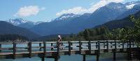 Cycling over Green Lake in Whistler Valley | Tourism Whistler/Feet Banks