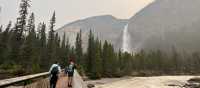 Crossing the bridge to the foot of Takakkaw Falls in Yoho National Park | Kalaya Mckenzie